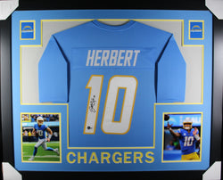 Justin Herbert framed autographed powder blue jersey